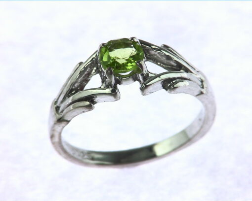 Peridot Set In Sterling Silver Ring.