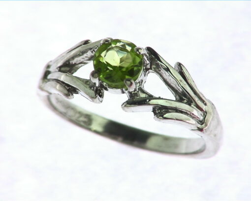 Peridot Set In Sterling Silver Ring.